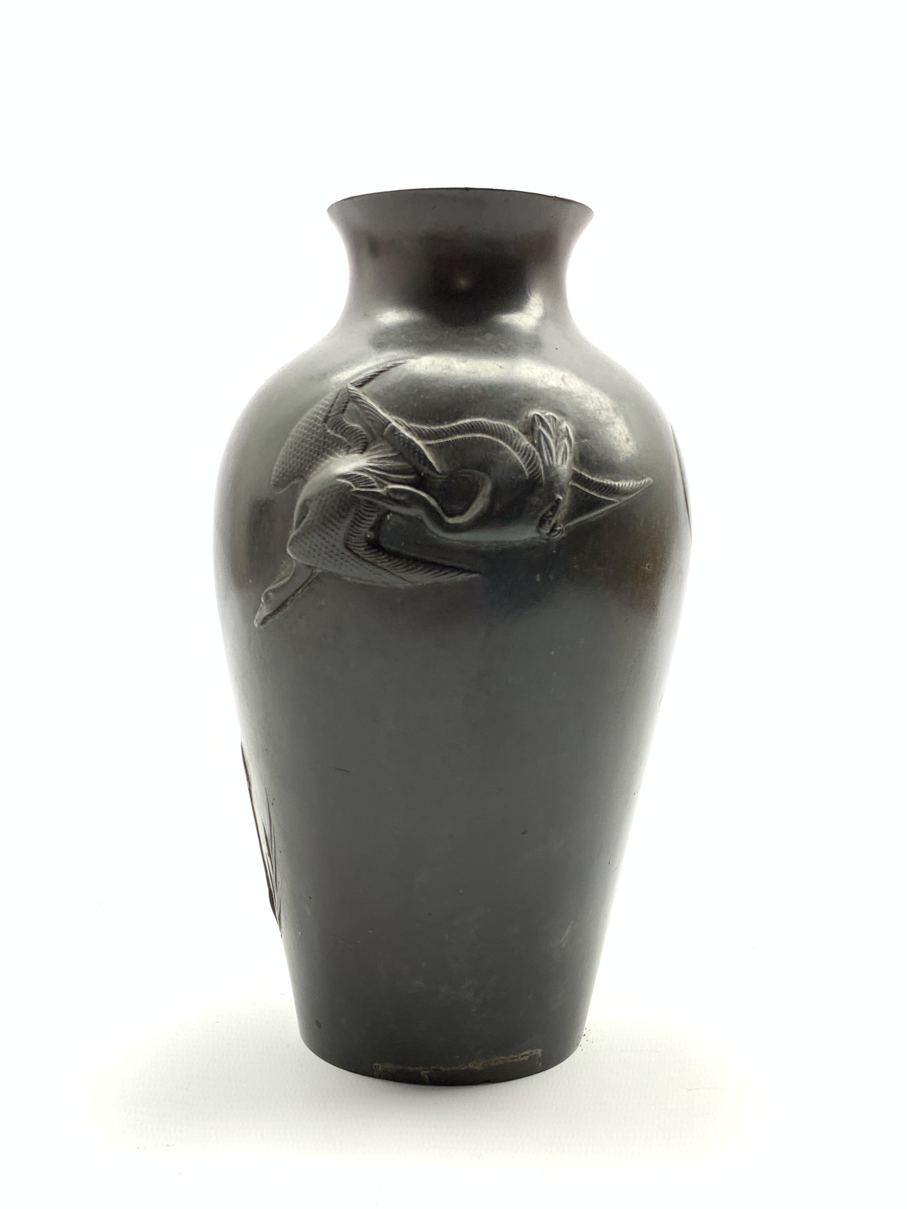 Japanese Meiji period bronze baluster vase decorated with a raised pattern of flying cranes H23cm