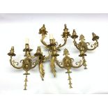 Three antique design gilt brass two branch wall lights with oval back plates H35cm and two others