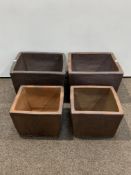 Two sets of two rustic cube plant pots,