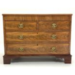 19th century mahogany chest fitted with two short and two long drawers, raised on bracket feet,