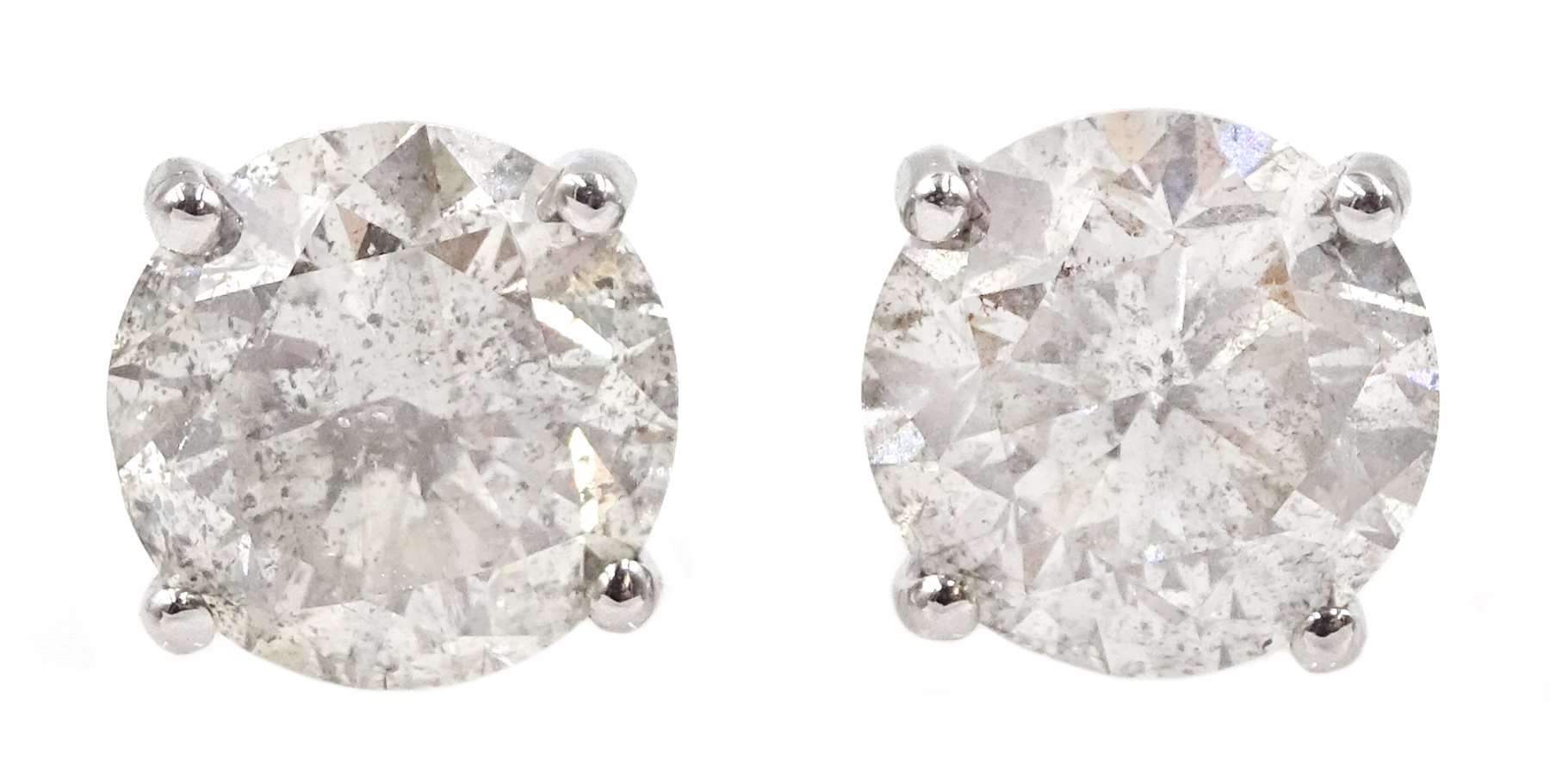 Pair of 18ct white gold diamond stud earrings, stamped 750, diamond total weight 3.52 carat