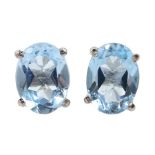 Pair of silver oval blue topaz stud earrings, stamped 925