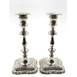 Pair of silver candlesticks with baluster stems and stepped square bases H24cm, Sheffield 1907 Make