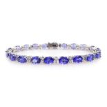 18ct white gold oval tanzanite and diamond link bracelet, hallmarked