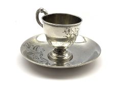 19th century Russian silver cup and saucer with engraved foliate decoration, D12cm (saucer) 4.2oz