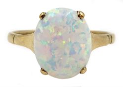 Gold oval opal ring, stamped 9ct