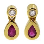 Pair of 18ct gold pear shaped ruby and diamond pendant earrings, hallmarked