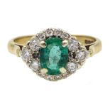 9ct gold oval emerald and diamond dress ring, hallmarked