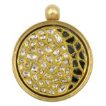 18ct gold swivel pendant polki diamonds kundan set in 24ct gold, the reverse set with black and whi