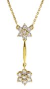 18ct gold flower cluster pendant necklace, stamped 18K 750