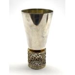 Elizabeth II silver and silver gilt goblet by Stuart Devlin with tapering bowl and pierced base H15