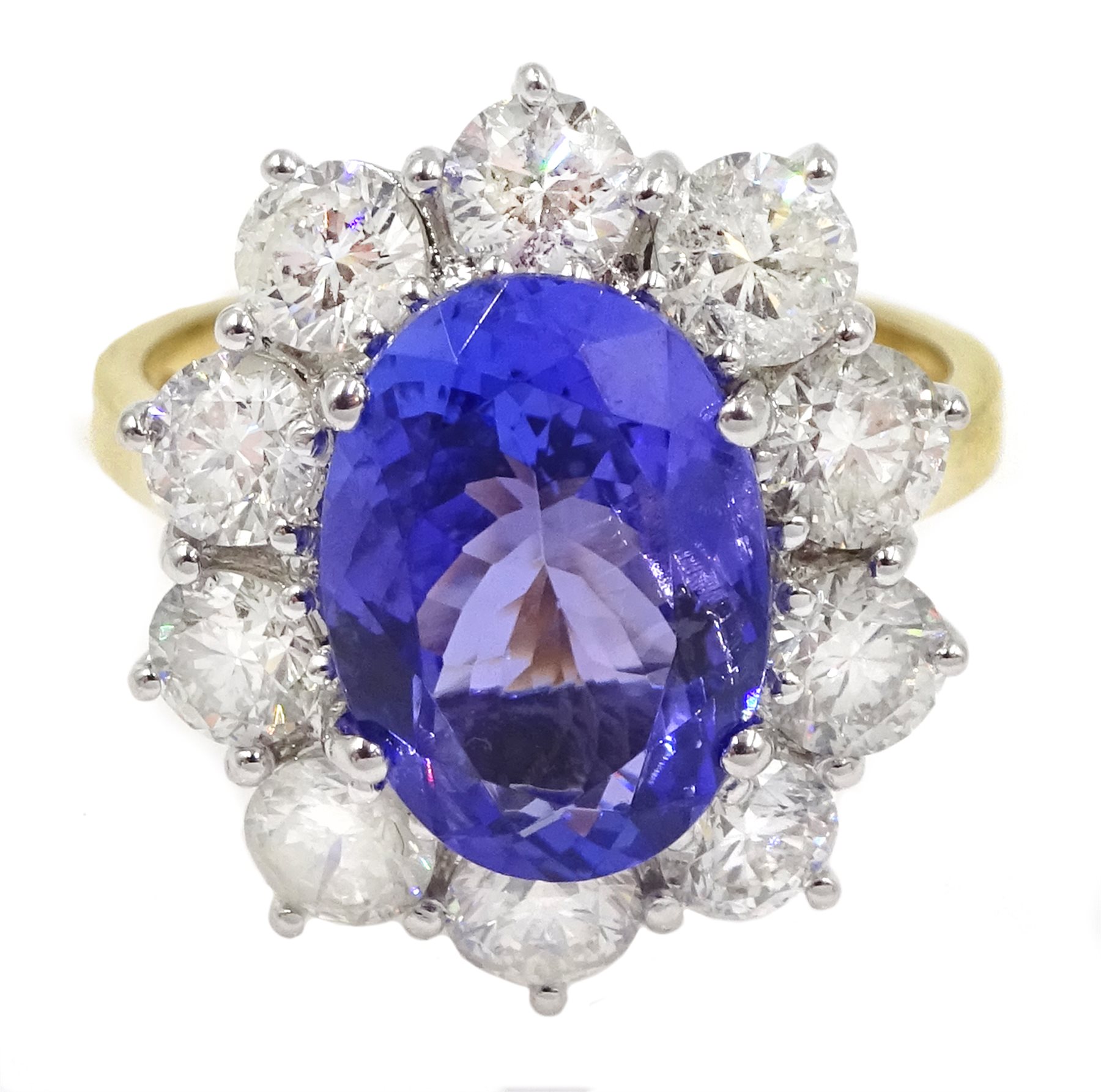 18ct gold oval tanzanite and diamond cluster ring, hallmarked, tanzanite approxx 4.10 carat, diamon