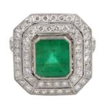 Platinum emerald and double row diamond ring, with diamond set shoulders, emerald approx 1.85 carat