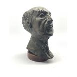 Plaster bust of an old gentleman with bronze finish on circular plinth, H36cm