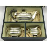 Walker & Hall three piece silver-plated tea set, with original box