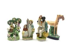 Staffordshire figure group in the style of Walton of male and female musicians in bocage H21cm, ano