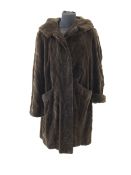 Dark brown shaved mink three quarter jacket, swag design with hood by Pelzmoden Bisegger, approx si