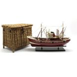 Scale model of a Trawler, L59cm, together with a wicker fishing basket (2)