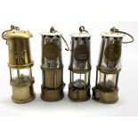 Three Eccles Protector lamp & Lighting Co. Miners lamps including Type GR.6 and a decorative brass