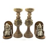 Pair of antique design carved and gilded stands H37cm and a pair of oak bookends with pottery figur