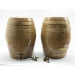 Pair of large stoneware barrels by George Skey, Tamworth with brass taps and inscribed 'Gin' and 'S