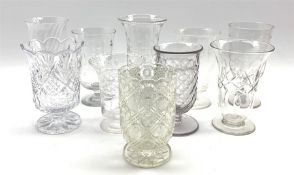 Collection of ten various glass celery vases and a pair of oil lamps with moulded glass reservoirs