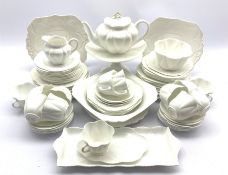 Shelley Dainty tea service in white comprising teapot, milk jug, thirteen cups and saucers, large b