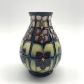 Moorcroft Violet pattern vase, designed by Sally Tuffin, H14cm