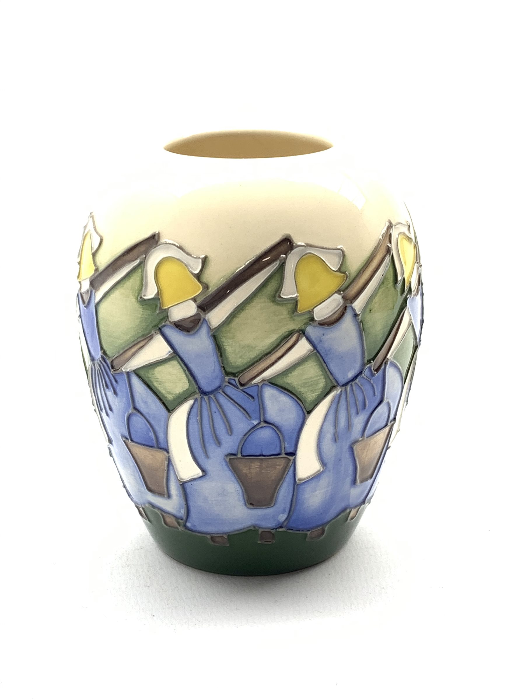Moorcroft vase decorated in the 'Eight Maids a Milking' pattern from the twelve days of Christmas s