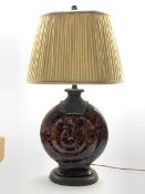 Large contemporary Ammonite form table lamp, inlaid shell work style finish with pleated shade, H84