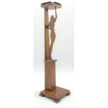 Early 20th century oak smokers stand carved as a silhouette of a lady with brass ashtray, H63cm