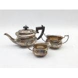Bachelor's silver three piece tea set of rectangular design with reeded decoration, the tea pot with