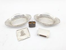 Pair of pierced silver oval sweetmeat dishes Chester 1933, silver matchbox holder, vesta case and a