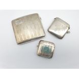 Engine turned silver cigarette case Birmingham 1926 and two silver vesta cases 5.4oz