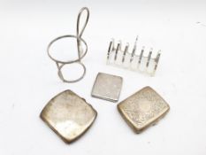 Engraved silver cigarette case, a plain cigarette case, Swedish silver book match holder, modern six