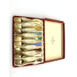 Set of eight Norwegian silver gilt and coloured enamel coffee spoons by David Andersen in original b