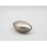 George III silver oval nutmeg grater with internal grille, engraved with a monogram London 1815 Make