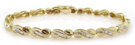 Gold baguette diamond link bracelet, stamped 14K