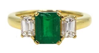 18ct gold emerald and baguette cut diamond ring, hallmarked, emerald approx 1.20 carat, diamond tota