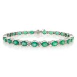 18ct white gold oval emerald and diamond bracelet, stamped 750, emerald total weight approx 7.80 car