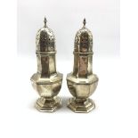 Pair of silver panel sided sugar castors of octagonal design H21cm Sheffield 1913 Maker Martin Hall