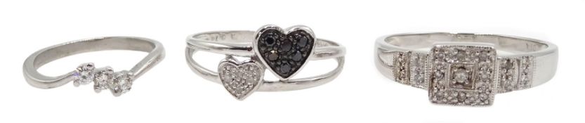 White gold heart design black and white diamond ring, and two diamond set rings, all 9ct hallmarked