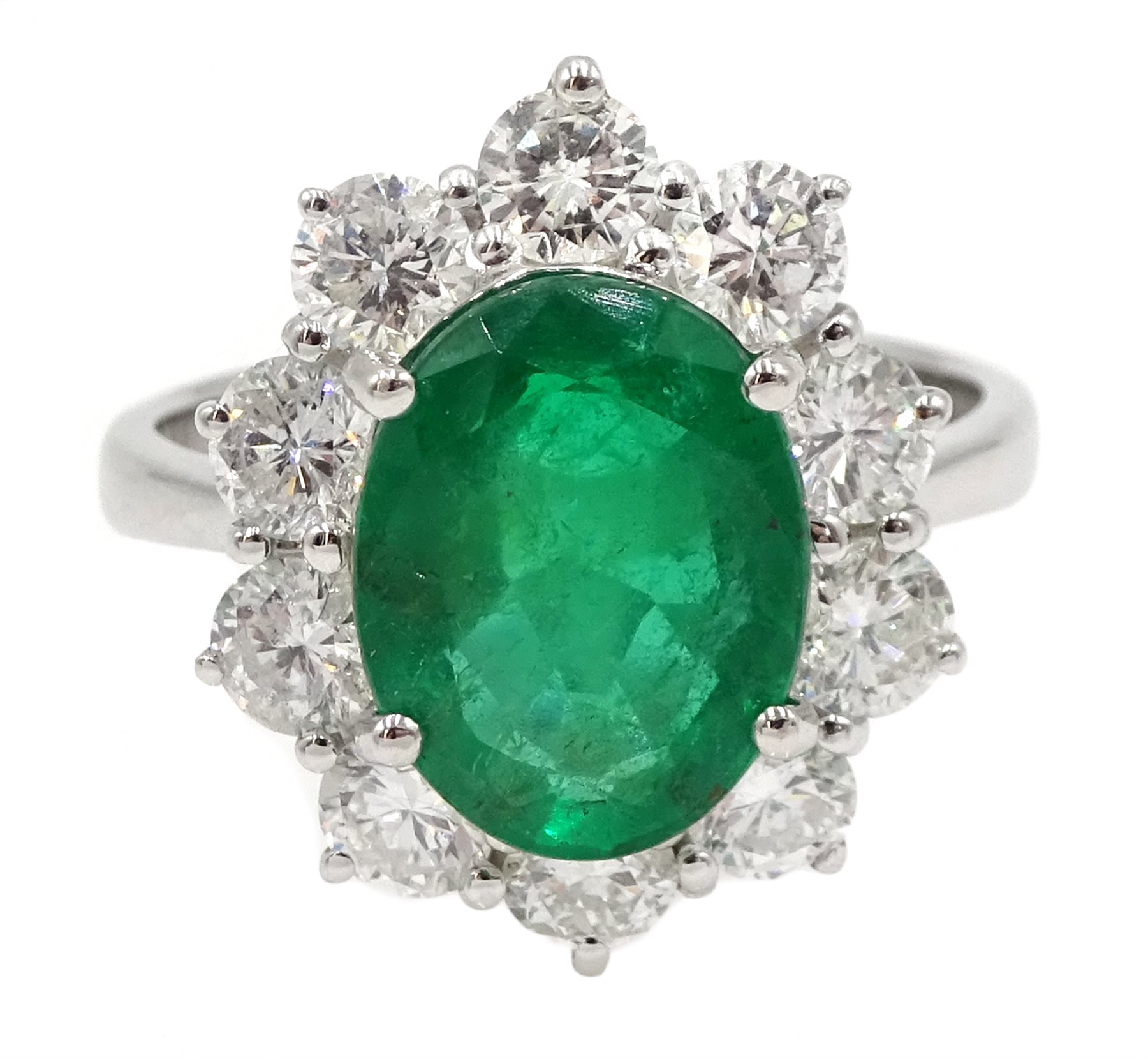 White gold oval emerald and round brilliant cut diamond ring, stamped 750, emerald approx 2.80 carat