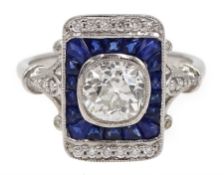 White gold cushion cut diamond, calibre cut sapphire and diamond diamond panel ring, stamped 18K, th