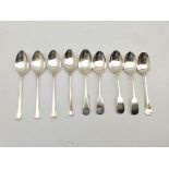 Three late Victorian silver fiddle pattern dessert spoons Sheffield 1897, four silver dessert spoons