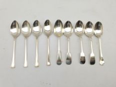 Three late Victorian silver fiddle pattern dessert spoons Sheffield 1897, four silver dessert spoons