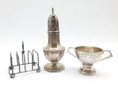 Silver panel sided sugar castor Chester 1921, small silver two handled trophy and a four division to