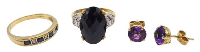 Gold oval briolette cut black onyx ring with diamond set shoulders, gold sapphire and diamond half e