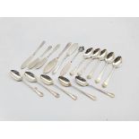Five silver tea spoons with chased stems Sheffield 1915, four engraved silver tea spoons and six var