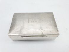 Silver cigarette box with engine turned cover engraved with initials L14cm Birmingham 1927